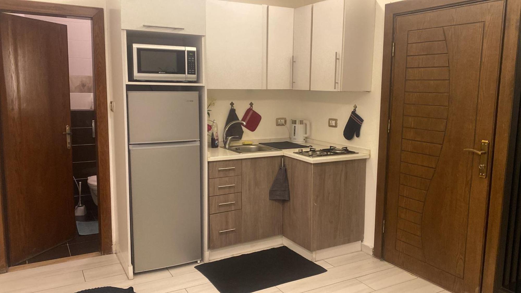 Dair Ghbar Apartment Амман Номер фото