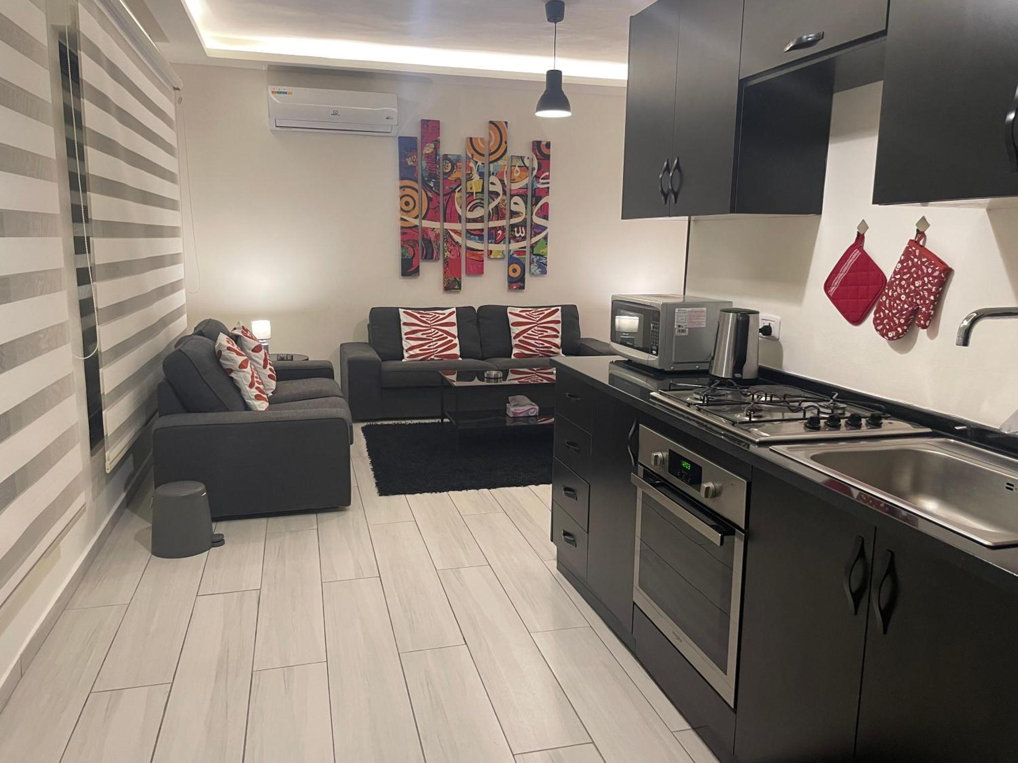 Dair Ghbar Apartment Амман Номер фото